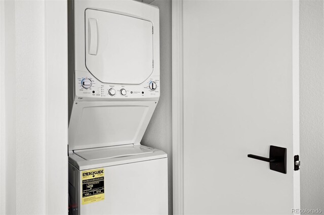1250 W Osceola St Unit 2, Denver, CO 80204 - washroom with stacked washing machine and dryer