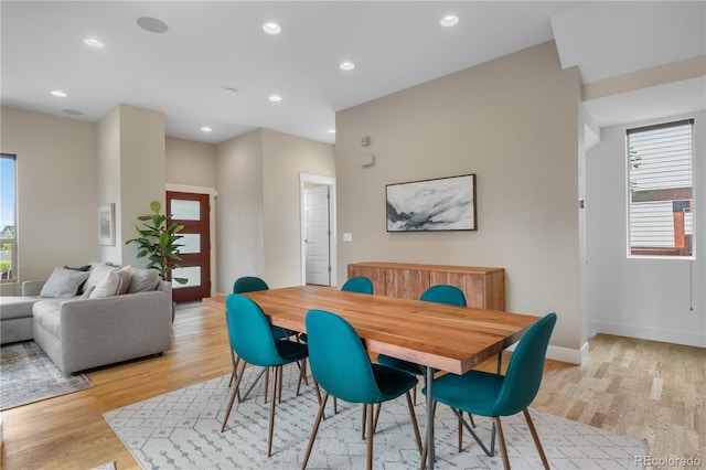 5046 Uinta St, Denver, CO 80238 - dining room with light wood-type flooring and recessed lighting