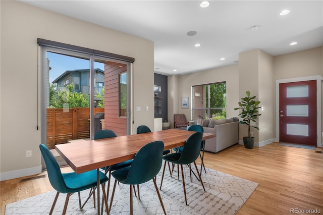5046 Uinta St, Denver, CO 80238 - dining area featuring light wood finished floors and recessed lighting