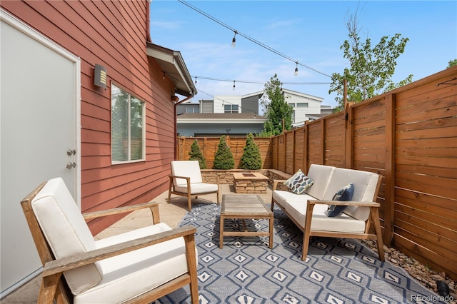 5046 Uinta St, Denver, CO 80238 - fenced backyard with an outdoor living space and a patio area