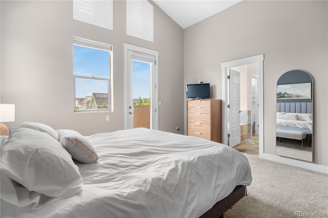 5046 Uinta St, Denver, CO 80238 - bedroom featuring carpet floors, access to outside, high vaulted ceiling, and ensuite bath