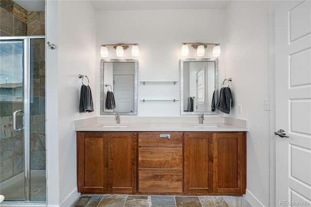 5046 Uinta St, Denver, CO 80238 - bathroom featuring double vanity, a shower stall, and stone finish flooring