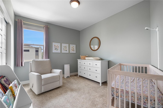 5046 Uinta St, Denver, CO 80238 - bedroom with a crib and light carpet