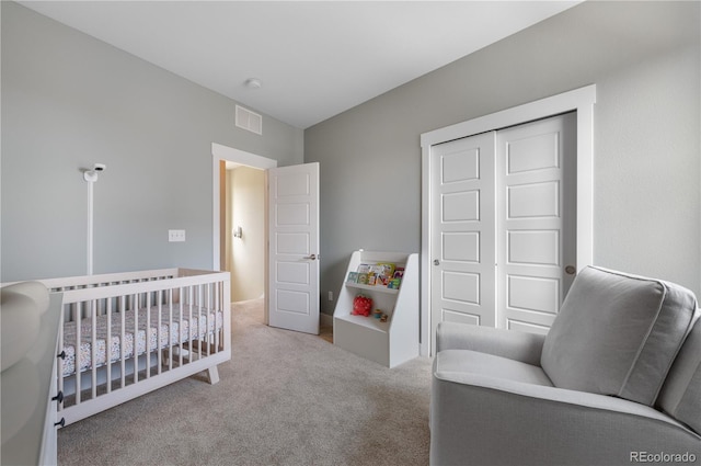5046 Uinta St, Denver, CO 80238 - bedroom with carpet, a closet, and a crib