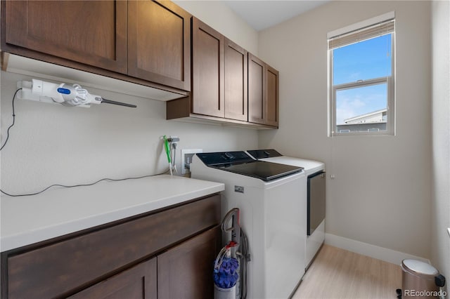 5046 Uinta St, Denver, CO 80238 - laundry area with cabinet space, independent washer and dryer, and light wood-style floors