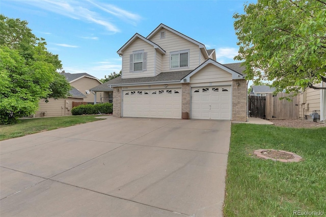2246 S Ensenada St, Aurora, CO 80013 - traditional-style home featuring brick siding, driveway, roof with shingles, and a garage