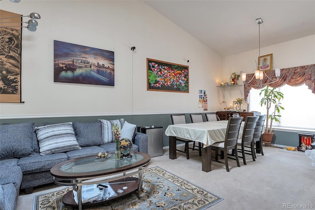 2246 S Ensenada St, Aurora, CO 80013 - carpeted living area with lofted ceiling and a chandelier