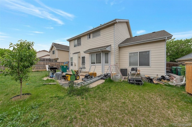 2246 S Ensenada St, Aurora, CO 80013 - back of house with central AC unit