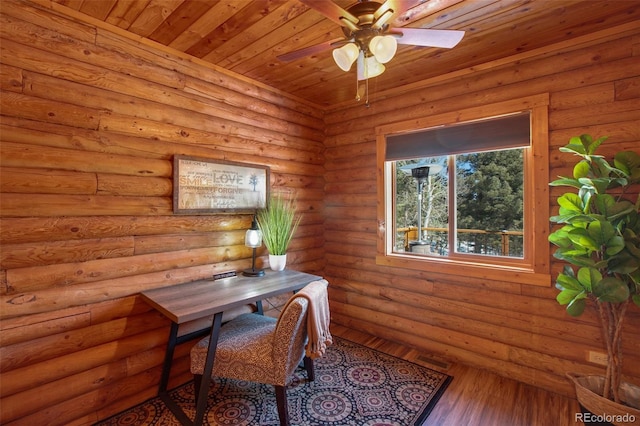 office space featuring visible vents, wood finished floors, and ceiling fan