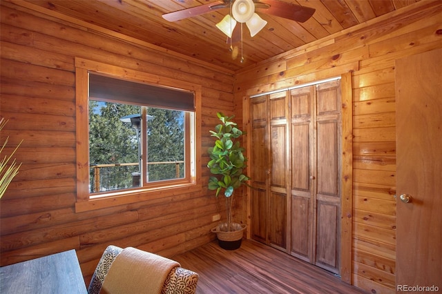 interior space with ceiling fan and wood finished floors