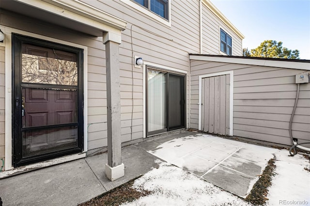 doorway to property with a patio area