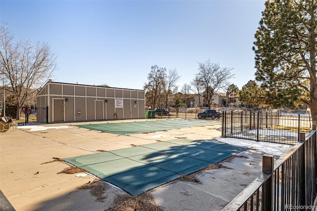 view of swimming pool with a patio area