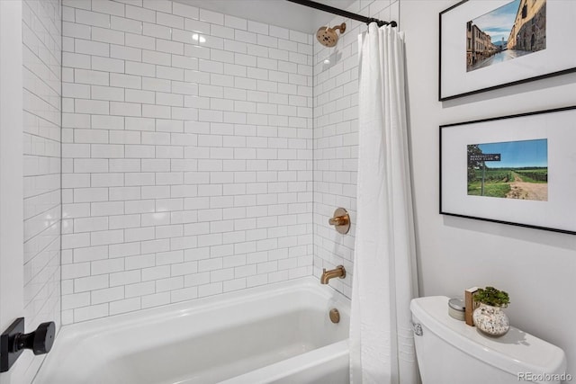 bathroom with toilet and shower / bath combo with shower curtain