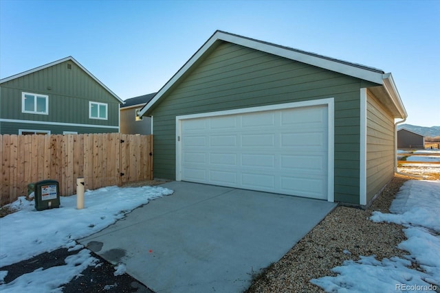 view of snow covered garage