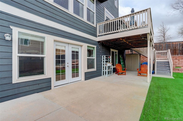 view of patio featuring stairway, french doors, and a wooden deck
