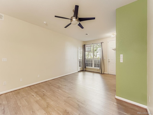 9896 W Freiburg Dr Unit 1D, Littleton, CO 80127 - unfurnished room with a ceiling fan and wood finished floors