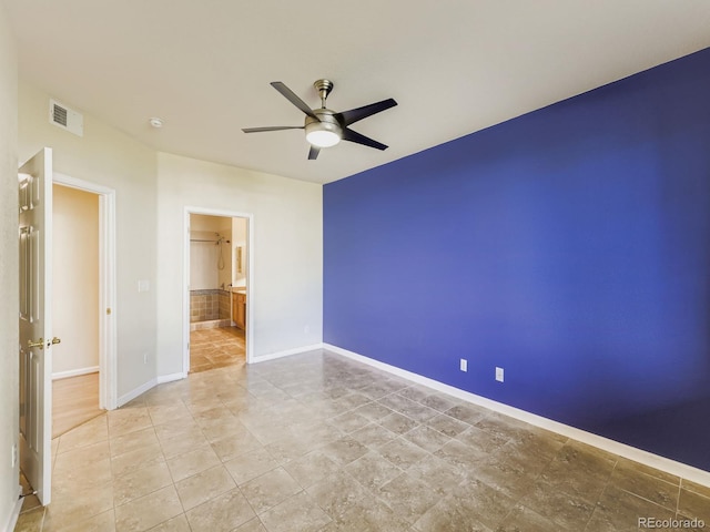 9896 W Freiburg Dr Unit 1D, Littleton, CO 80127 - unfurnished bedroom with a ceiling fan and ensuite bathroom