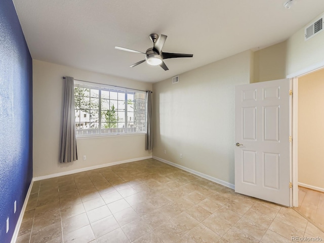 9896 W Freiburg Dr Unit 1D, Littleton, CO 80127 - unfurnished room featuring ceiling fan and light tile patterned flooring