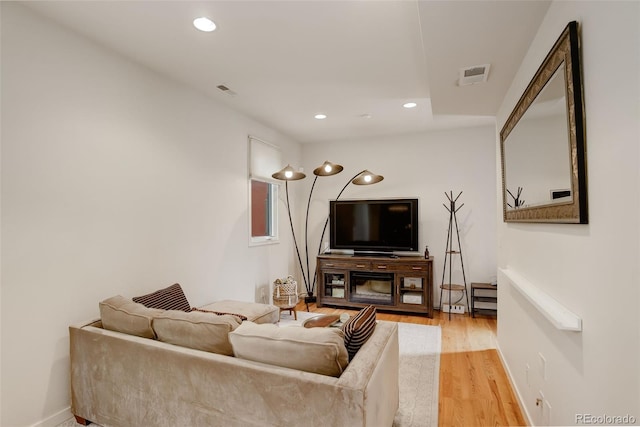 2138 N Glenarm Pl, Denver, CO 80205 - living area featuring light wood-style flooring, recessed lighting, and baseboards