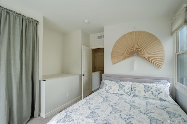 2138 N Glenarm Pl, Denver, CO 80205 - carpeted bedroom with baseboards