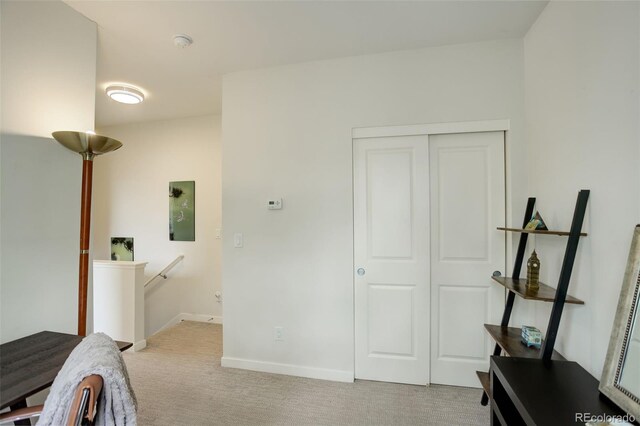2138 N Glenarm Pl, Denver, CO 80205 - hall with an upstairs landing, light colored carpet, and baseboards