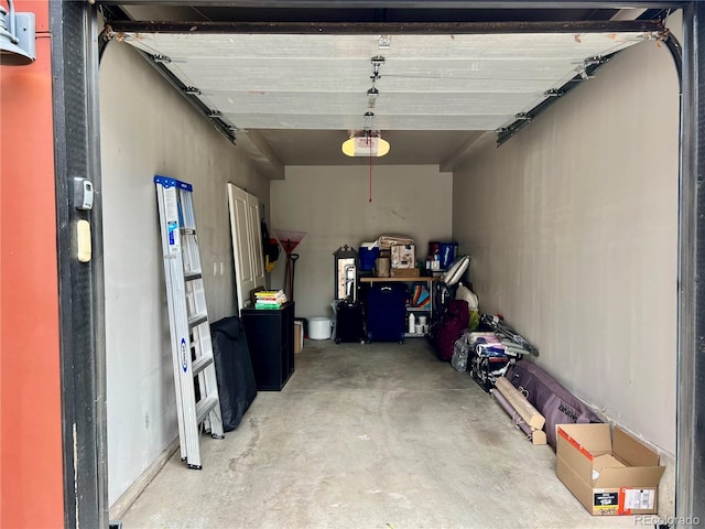 2138 N Glenarm Pl, Denver, CO 80205 - garage featuring a garage door opener