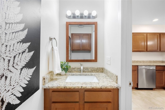 7373 E Iowa Ave Unit 1124, Denver, CO 80231 - bathroom with vanity and tile patterned floors