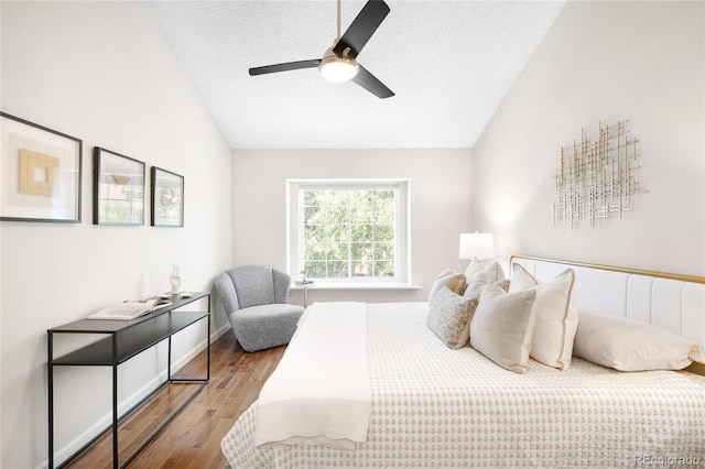 7373 E Iowa Ave Unit 1124, Denver, CO 80231 - bedroom with vaulted ceiling, wood finished floors, a textured ceiling, and a ceiling fan