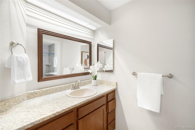 7373 E Iowa Ave Unit 1124, Denver, CO 80231 - bathroom with vanity and a shower