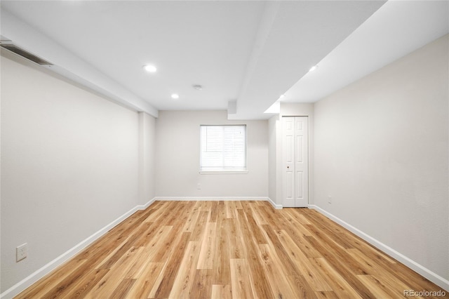 7373 E Iowa Ave Unit 1124, Denver, CO 80231 - empty room featuring light wood-style flooring and recessed lighting