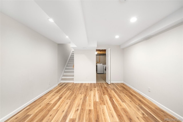 7373 E Iowa Ave Unit 1124, Denver, CO 80231 - finished basement with independent washer and dryer, recessed lighting, light wood finished floors, and stairs