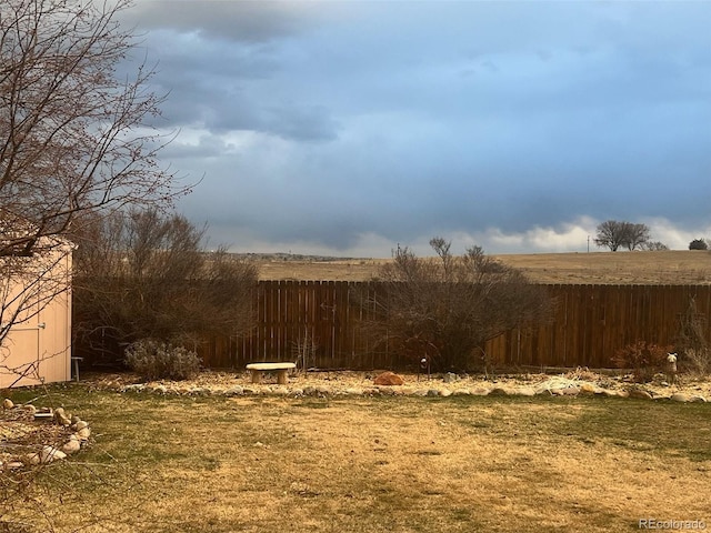 view of yard with fence