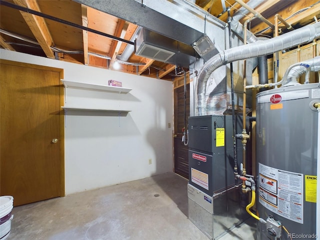 utility room featuring water heater