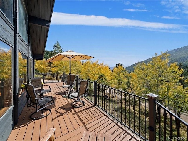 239 Aspen Pl, Evergreen, CO 80439 - deck featuring a view of trees