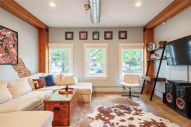 117 Elati St Unit 1, Denver, CO 80223 - living area with concrete floors, recessed lighting, and plenty of natural light