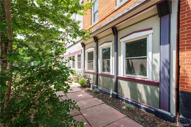 117 Elati St Unit 1, Denver, CO 80223 - view of home's exterior with brick siding