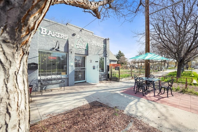 117 Elati St Unit 1, Denver, CO 80223 - back of property with a chimney