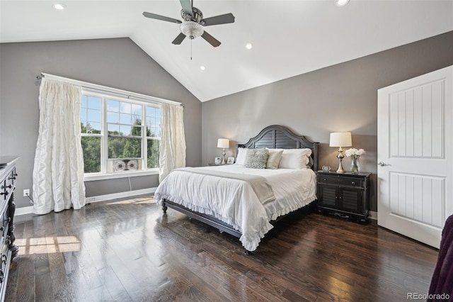 bedroom with ceiling fan, dark wood-type flooring, and vaulted ceiling