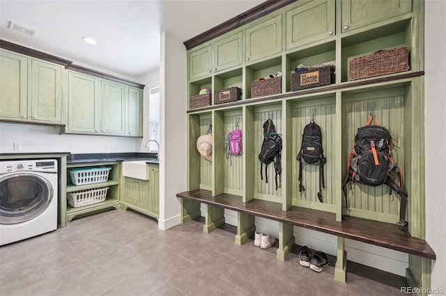 mudroom with washer / dryer and sink