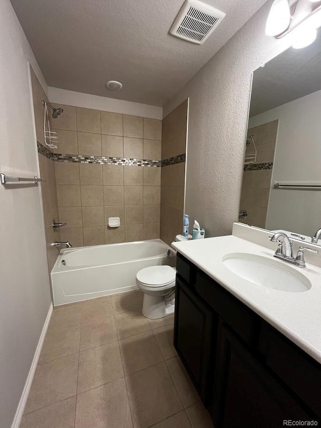 full bathroom with tile patterned floors, visible vents, toilet, a textured ceiling, and bathing tub / shower combination