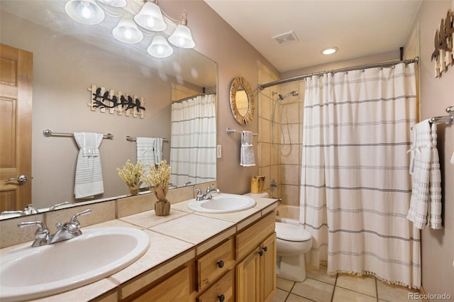 full bathroom with tile patterned flooring, vanity, shower / bath combo, and toilet