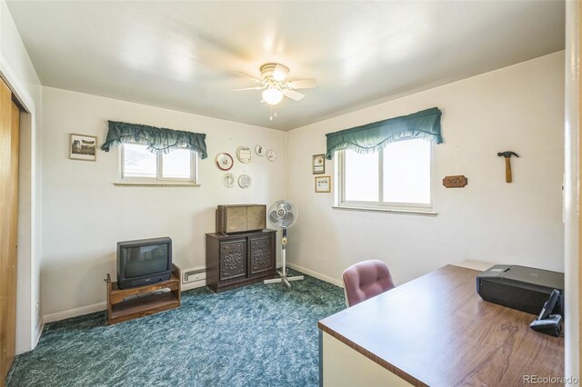 carpeted home office with ceiling fan