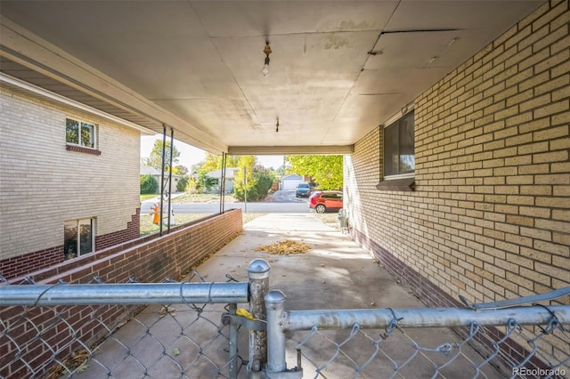view of patio / terrace with an attached carport