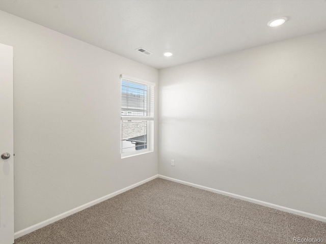 view of carpeted spare room