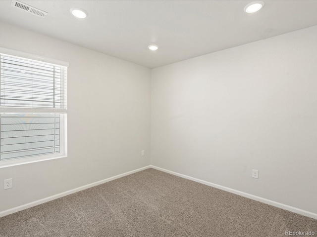 view of carpeted spare room