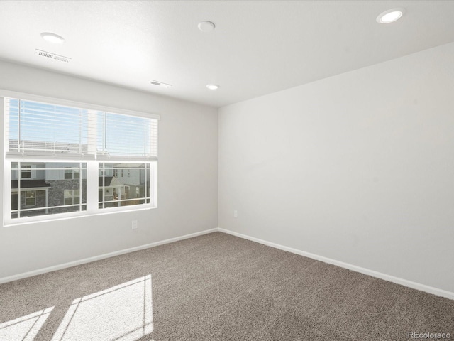 view of carpeted spare room