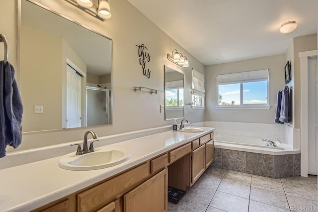 10155 Silver Maple Cir, Highlands Ranch, CO 80129 - bathroom with a garden tub, double vanity, tile patterned floors, and a shower with shower door
