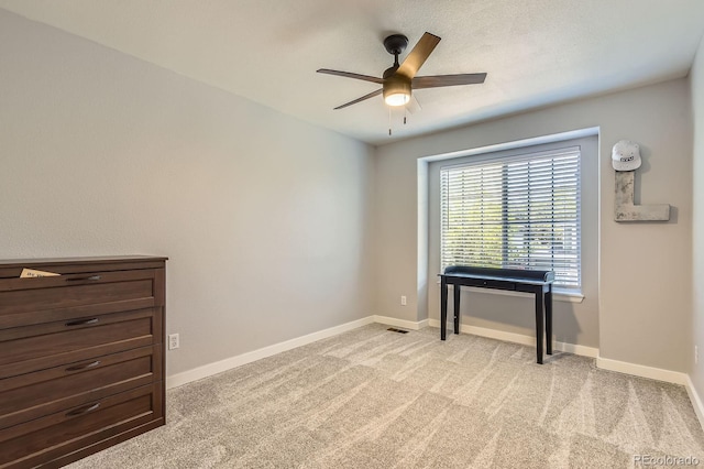 10155 Silver Maple Cir, Highlands Ranch, CO 80129 - empty room featuring a ceiling fan, light carpet, and baseboards