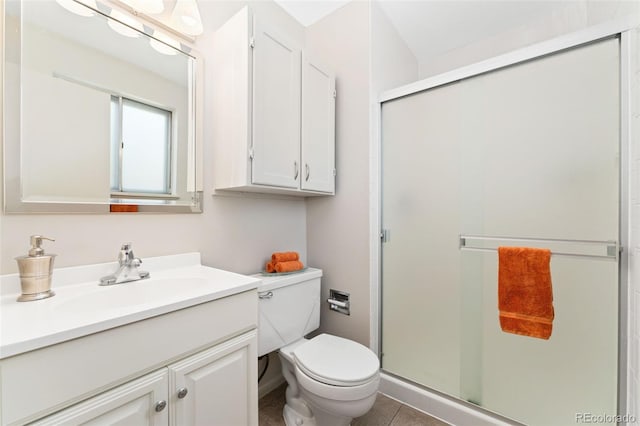 3082 S Laredo Cir, Aurora, CO 80013 - full bathroom featuring vanity, a stall shower, and tile patterned flooring