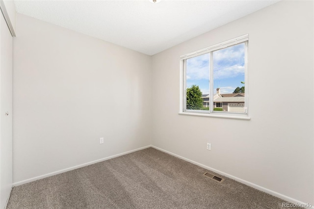 3082 S Laredo Cir, Aurora, CO 80013 - empty room with carpet floors and baseboards